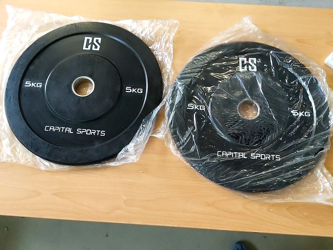 2x gumové závaží na činku (5kg) Capital Sports Resilior (10028766)