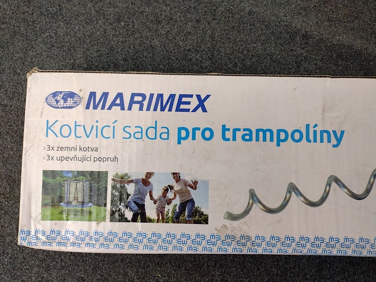 Kotvící sada pro trampolíny - kotvy, popruhy Marimex chybí 1 popruh