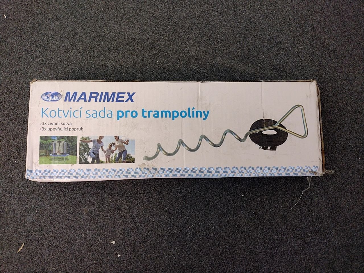 Kotvící sada pro trampolíny - kotvy, popruhy Marimex chybí 1 popruh