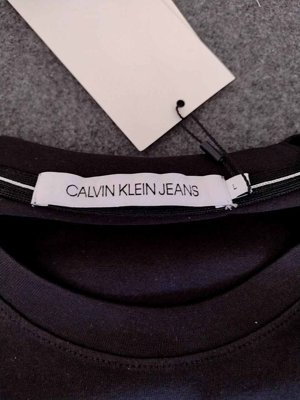 Dámské triko s krátkým rukávem Calvin Klein Velikost L